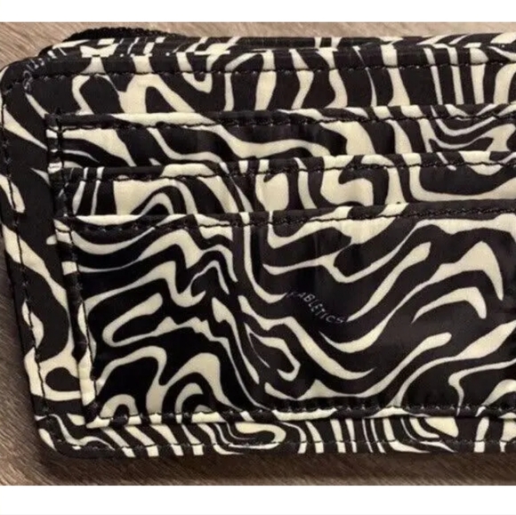 Fabletics Modular Crossbody ClipBag Mini Marbled Zebra Print. Black/ White - Picture 5 of 7